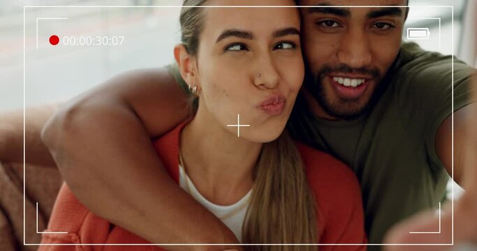 Selfie video, love and happy couple having fun together and recording on camera screen with silly face. Viewfinder, goofy and young man filming funny, bonding and loving moment while relaxing in home