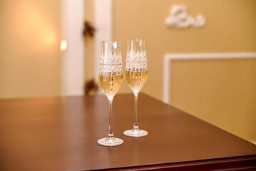 Photo of decorated wedding glasses