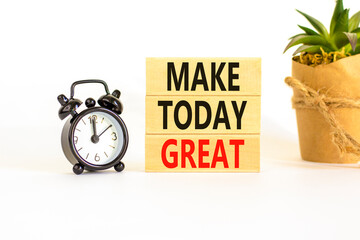 Motivation and Make today great symbol. Concept words Make today great on wooden blocks on a...