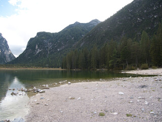 Autumn morning after the rain by the lake of Dobbiaco(Toblacher See). South Tyrol, province of Bolzano. Dolomites, Italy.