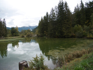 Autumn morning after the rain by the lake of Dobbiaco(Toblacher See). South Tyrol, province of...