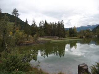 Autumn morning after the rain by the lake of Dobbiaco(Toblacher See). South Tyrol, province of...