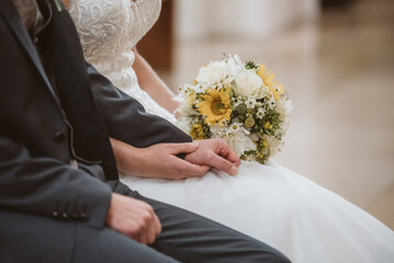holding hands on wedding day - 548316871