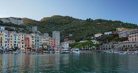 Fototapeta na wymiar The town of Porto Venere, one of the most famous and visited towns in Liguria, Italy, during an afternoon of an Autumn day - October 2022.