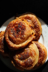 savory pastry filled with leek. Oven baked and fried pastry with sesame and black cumin. rose pastry