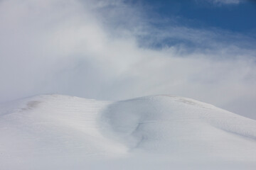 Fototapeta na wymiar Snowy Mountains in the Kars Province, Kars Turkey