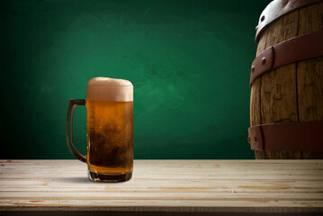 Glass beer on wood background with copyspace. High quality photo