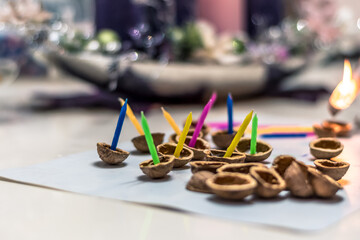 christmas custom and tradition in eastern Europe, preparation of nutshells with candles