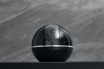 Panoramic security camera explores and controls empty office