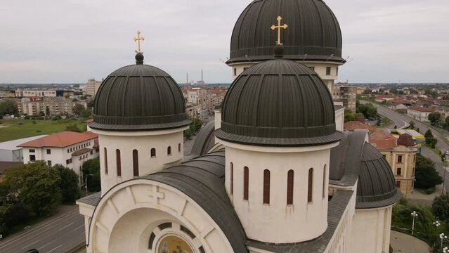 Aerial video of the Orthodox Cathedral in Arad city, Romania. The footage was shot from a drone while flying backwards away from the cathedral. 