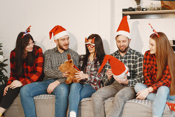 Young people celebrating New Year at home party