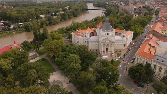 Aerial footage of the Cultural palace in Arad, Romania. Video was shot from a drone with the camera pointed downwards and flying forward towards the left side of the palace and banking right.