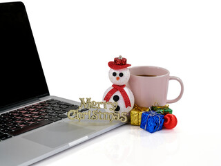 laptop, coffee and Christmas decorations