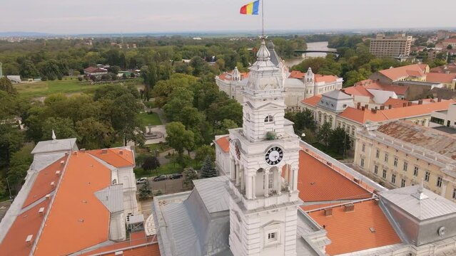 Aerial video of the Administrative Palace tower in Arad city, Romania. Footage was shot from a drone while flying towards the buildings tower clock.