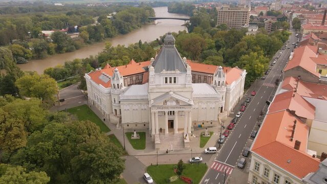 Aerial footage of the cultural palace in Arad city center, Romania. The video was shot from a drone while flying forward towards the building and lowering altitude.