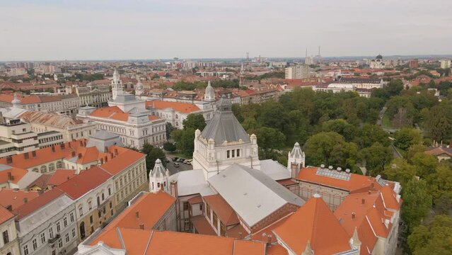 Aerial footage of the Cultural palace in Arad, Romania. Video was shot from a drone with the camera pointed forward and flying forward from the back side of the building, passing by. 