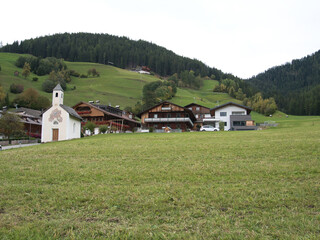 A walk on a rainy and foggy morning in the municipality of Dobbiaco. Autonomous Province of Bolzano - South Tyrol. Dolomites, Italy.