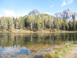 A sunny autumn day along Lake Antorno, Dolomites, Italy.