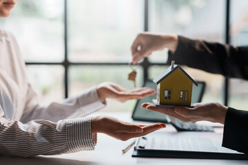 Real estate agent and customer make contract to buy and sell house and land approval of a contract...