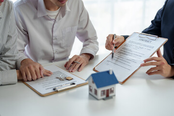 Real estate agent and customer make contract to buy and sell house and land approval of a contract...