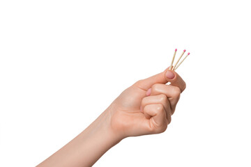 Matches in a female hand, isolate.
