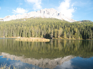 Afternoon walk in autumn around Misurina lake, Dolomites, Italy