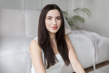 portrait of a young beautiful woman at home