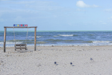Progreso, Yucatan, Mexico: An empty wooden swing with 