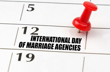 On the calendar grid, the date and name of the holiday - International Day of marriage agencies