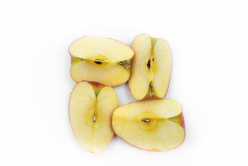 Naklejka na ściany i meble Apple on a white background. Pieces of a cut apple.