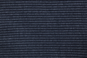 Blue finely knitted fabric background