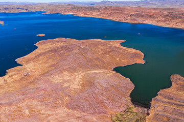 500 meter aerial view of the Laguna Lagunillas in Puno District, Peru, a wildlife area home to...