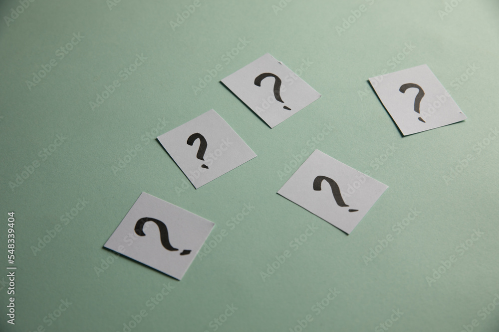 Poster papers with a question mark