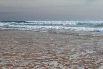 Fototapeta premium Waves on the beach. beautiful colours/colours