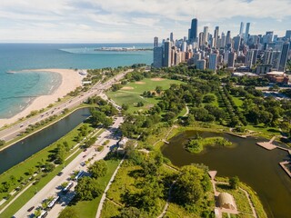 Aerial of the Lincoln park in Chicago with a display of skyscrapers and lake Michigan, the USA