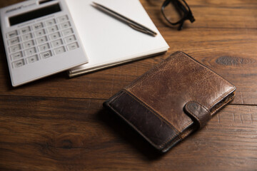 Leather wallet, notepad and calculator