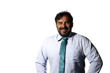 Portrait of a businessman smiling, wearing a shirt and a green tie, looking at the camera.