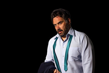 Tired man with a loose tie around his neck