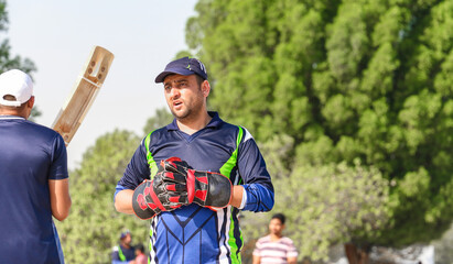 local people playing cricket
