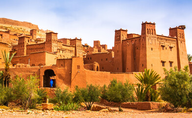 Amazing view of Kasbah Ait Ben Haddou near Ouarzazate in the Atlas Mountains of Morocco. UNESCO World Heritage Site since 1987. Artistic picture. Beauty world. - obrazy, fototapety, plakaty