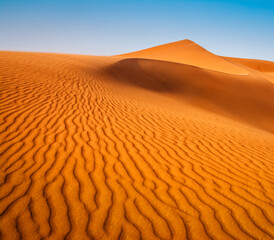 Amazing view of sand dunes in the Sahara Desert. Location: Sahara Desert, Merzouga, Morocco. Artistic picture. Beauty world.