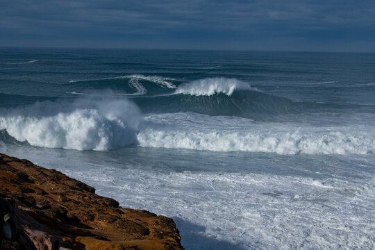 Big wave surfing in Nazare, Portugal