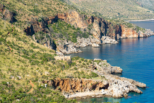 The Zingaro National Park in Sicily. Small coves with pebble beach offers the possibility to swim in the crystal-clear water of the Mediterranean Sea. It is the oldest nature reserve on the island