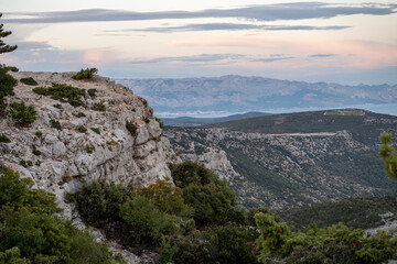 Naklejka premium Wonderful landscape of Brac island from Vidova Gora mountain with view on distant Biokovo mountain on croatian mainland, across the sea