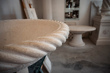 Close up of hand made fountain bowl in stonemason school in the town of Pucisca, located on Brac island, Croatia