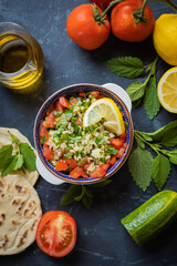Lebanese tabbouleh salad with bulgur, parsley, tomato and cucmber