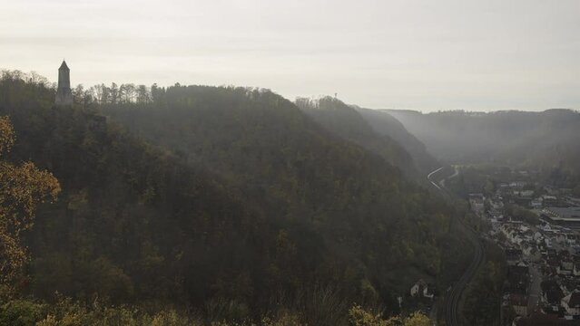 Tower Oedenturm and valley Rohrachtal on a misty morning in autumn time lapse