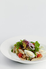fresh greek salad with egg and vegetables