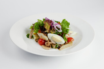 fresh greek salad with egg and vegetables