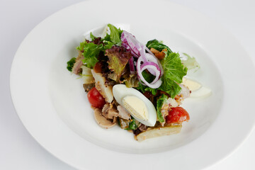 fresh greek salad with egg and vegetables